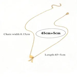 Gold titanium steel necklace with heart and letter A pendant on a white background
