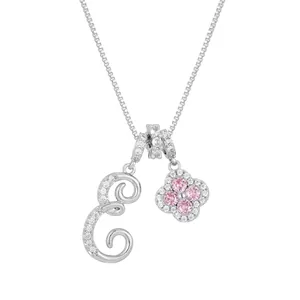 Letter E and pink clover pendant necklace with micro-pave cubic zirconia stones