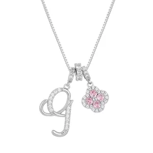Silver letter g pendant necklace with pink clover and micro-pave cubic zirconia