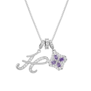 Silver letter K necklace with purple clover pendant and white cubic zirconia accents