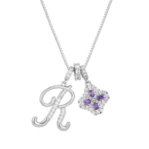 Silver necklace with letter R pendant and purple clover zircon stone on white background