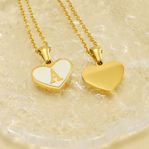 Gold stainless steel heart necklace with white enamel and golden letter A pendant