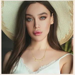 Golden Sophia name pendant necklace in 18K gold plated alloy on model