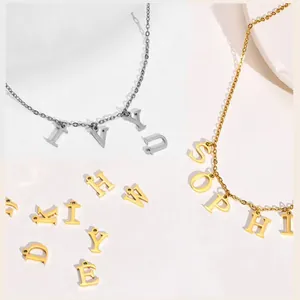 Minimalist gold and silver custom name necklaces with loose alphabet letter charms