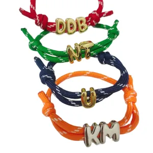 Colorful woven rope bracelets with gold personalized metal bubble initial letter charms