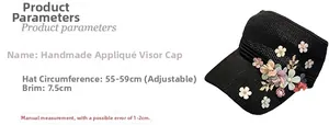 Detail of black knit sun hat featuring floral appliques and adjustable 55-59cm brim size