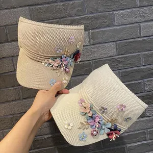 Women's handmade knit open top sun visor hat with floral applique and bead accents