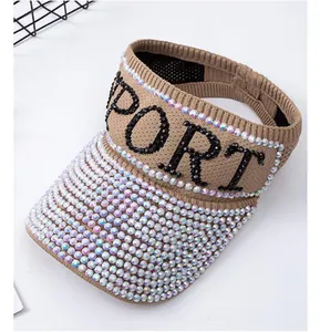 Detail view of khaki knitted sun visor with shiny rhinestones and SPORT embroidery