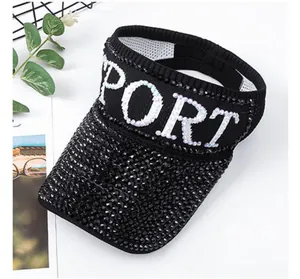 Detail of black rhinestone sun visor with SPORT letters and breathable sweatband