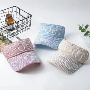 Three knit SPORT sun visors with rhinestones in pink, blue, and khaki for sports