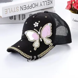 Fashionable black mesh baseball cap featuring pearl butterfly decor and rhinestone brim