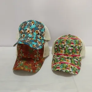 Detailed view of breathable mesh ponytail baseball caps with sunflower and cactus prints