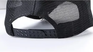 Detail view of the breathable mesh back and adjustable snapback closure on a black baseball cap