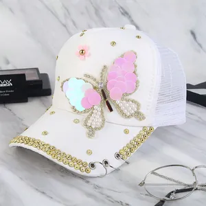 White sun hat with pearl butterfly sequins and breathable mesh for summer wear