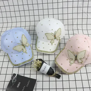 Women's baseball cap set with pearl butterfly patch, rhinestones and golden studs