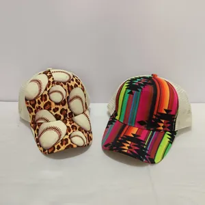 Detail view of leopard print and tribal stripe trucker hats with breathable mesh backing