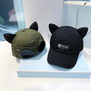 Stylish cat ear baseball cap with aviator goggles decoration and minimalist logo patch