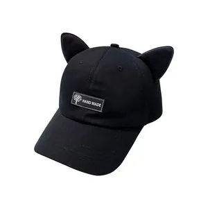 Cute black cat ear baseball cap with decorative pilot goggles and handmade patch detail