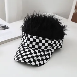 Detail of checkered visor hat with black hair wig and black white plaid pattern