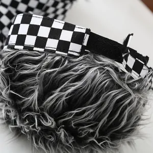 Macro shot of wig baseball cap with black and white checkered brim and adjustable strap