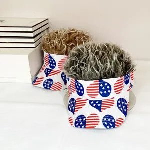 Detail view of Independence Day visor hats with brown and gray synthetic hair wig