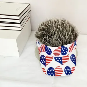 Detail of USA flag heart print and grey synthetic hair on a white visor sun hat