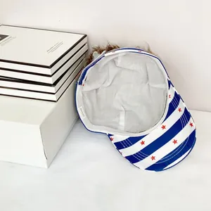 Detailed interior of USA flag baseball cap showing brown wig attachment and fabric lining