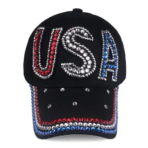 Close-up of USA letters in red, white and blue rhinestones on black denim baseball cap