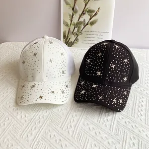 Close-up of sparkling rhinestone star pattern on mesh breathable baseball caps