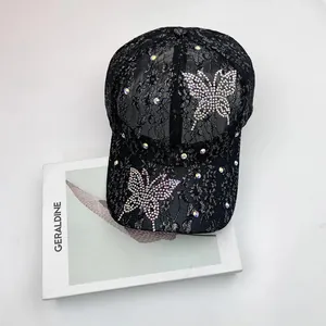 Black lace baseball cap with sparkling rhinestone butterfly design for sun protection