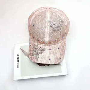 Pink lace baseball cap with rhinestone butterfly patterns and elegant sequin details