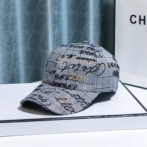 Detailed shot of the mesh baseball cap featuring CORE rhinestone logo and letter patterns