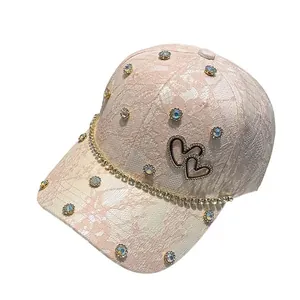 Women's pink lace baseball cap with sparkling rhinestones and heart charms
