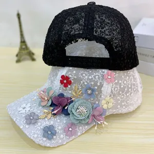 Sweet lace baseball caps with 3D floral accents and adjustable buckle in black and white