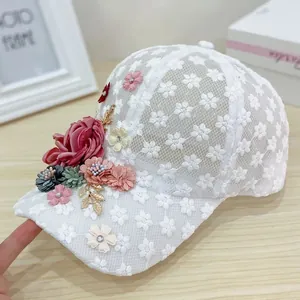 Detail of 3D flowers and daisy embroidery on white lace breathable baseball cap