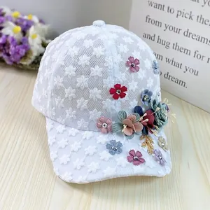 Breathable white lace baseball cap with colorful organza flowers and golden leaf accents