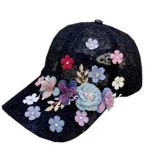 Black lace baseball cap with colorful 3D floral embroidery and gold leaf accents