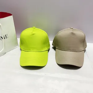 Five-panel neon green and beige cotton baseball caps with adjustable copper buckle