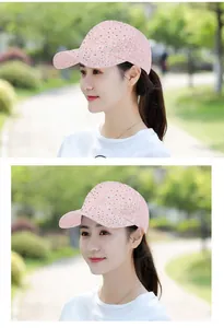 Detail of pink lace baseball cap featuring floral texture and sparkling rhinestone accents