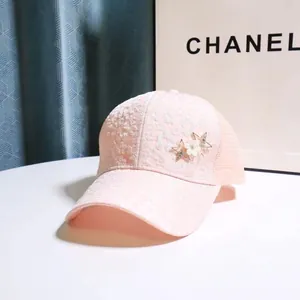 Pink lace baseball cap with rhinestone stars and mesh back for women's sun protection