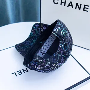 Macro view of adjustable snapback closure on holographic pattern baseball cap