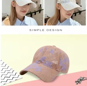 Detail of floral lace embroidery and breathable mesh on summer baseball cap for women