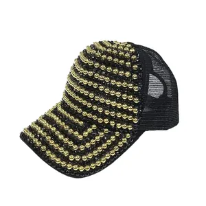 Black mesh baseball cap with gold beads, rhinestone embellishments, and ponytail hole