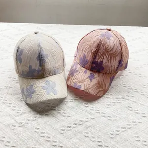 Breathable floral lace embroidery baseball cap for women in beige and pink tones