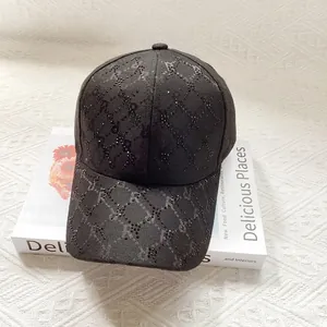 Detail of vintage jacquard pattern and black rhinestones on a stylish sun hat