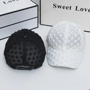 Breathable floral lace baseball cap for women with pearl accents in black and white colors
