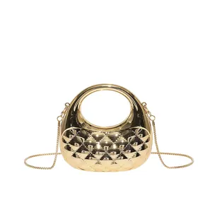 Elegant gold metallic frame evening bag with diamond quilted pattern and snake chain strap