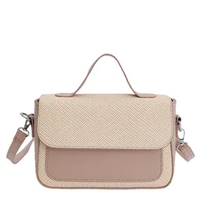 Contrast stitching crossbody bag with straw weave texture and leather accents