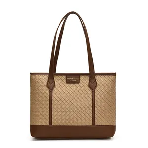Chic beige woven tote bag with dark brown leather straps and trim for daily commuting