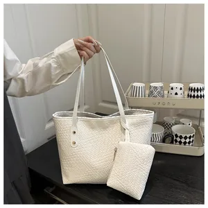 Detailed view of white woven texture tote bag set with matching small coin purse